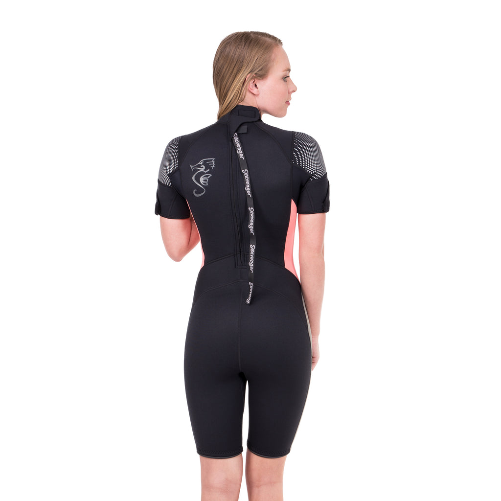 A black shorty wetsuit with taupe panels on the outer leg and coral side panels in 3mm neoprene.